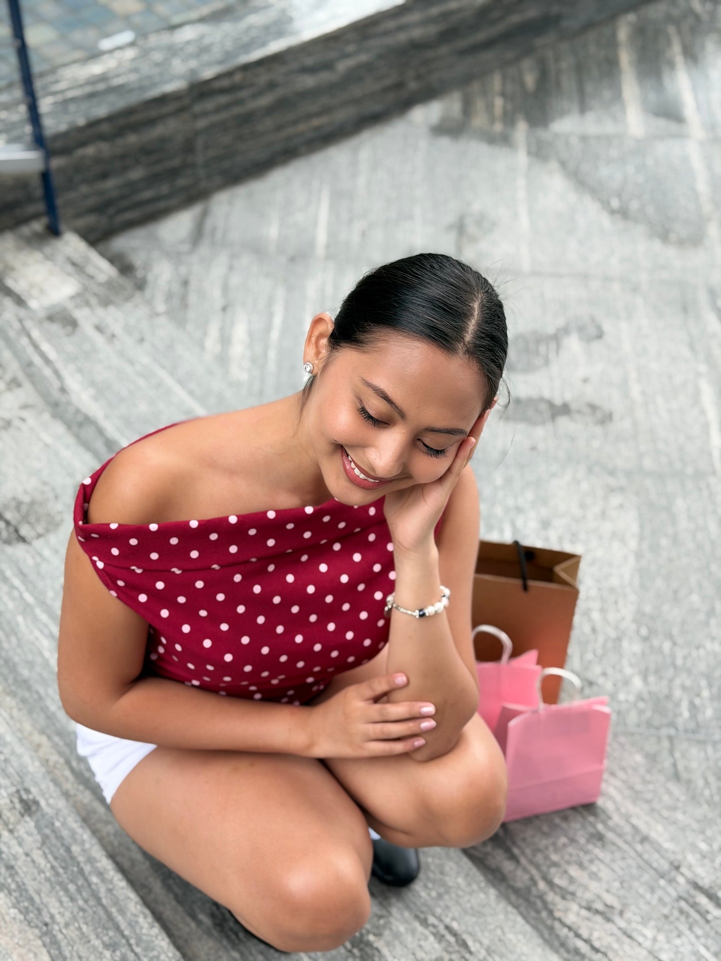 Candice Asymmetrical Top in Maroon Polka